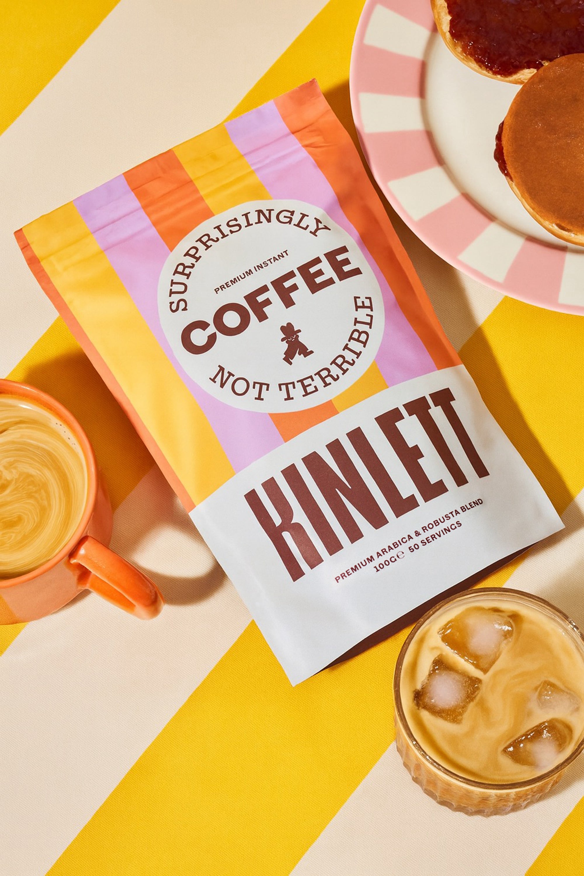 Kinlett coffee package with a cup of coffee and a pastry on a colorful background